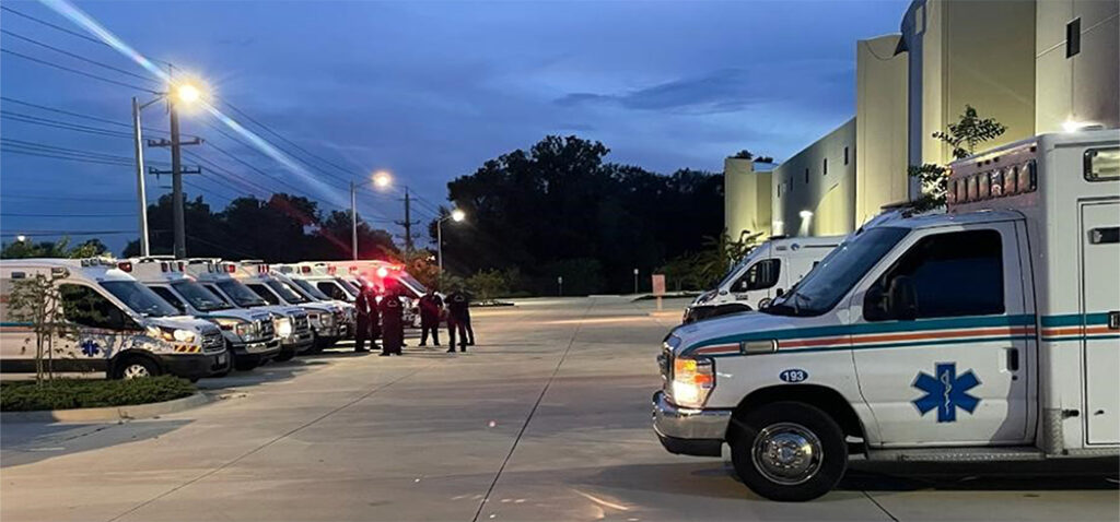 Parking Lot Showing Emergency Response Workers Ready To Provide Assistance in Healthcare Emergencies