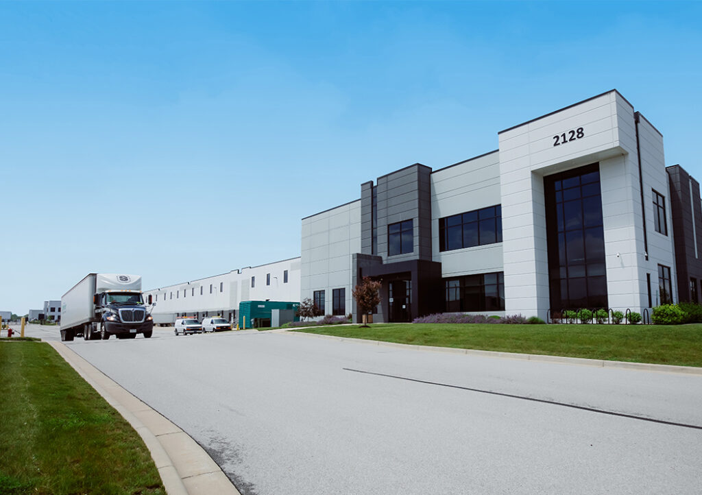 Exterior Shot of LSL Warehouse Building with Trucks